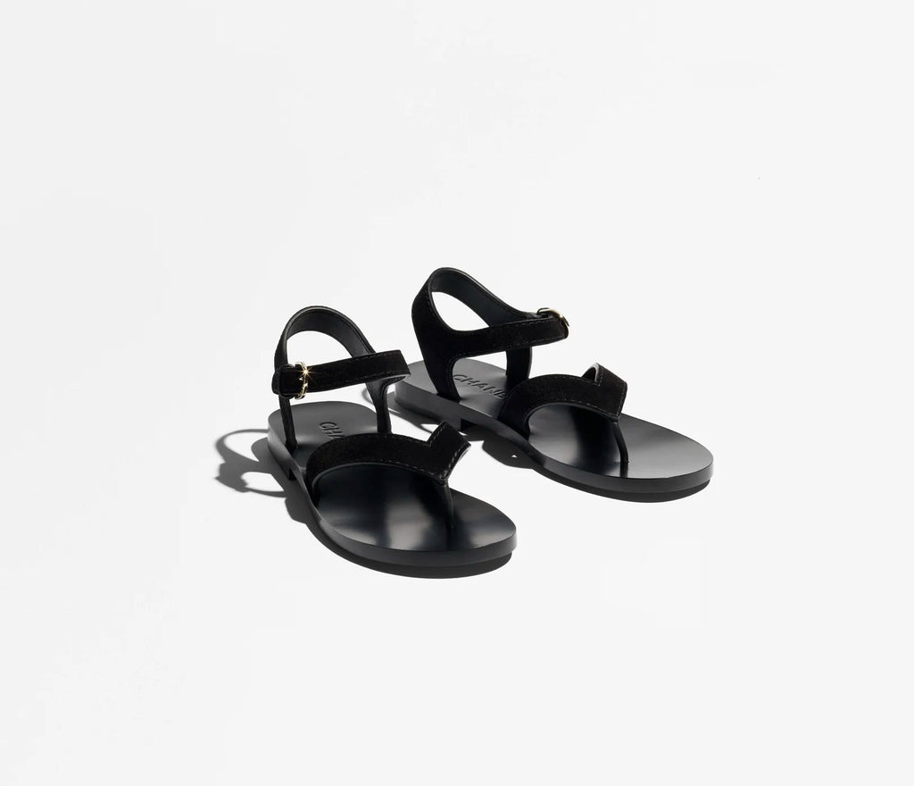 Black sandals on a white background