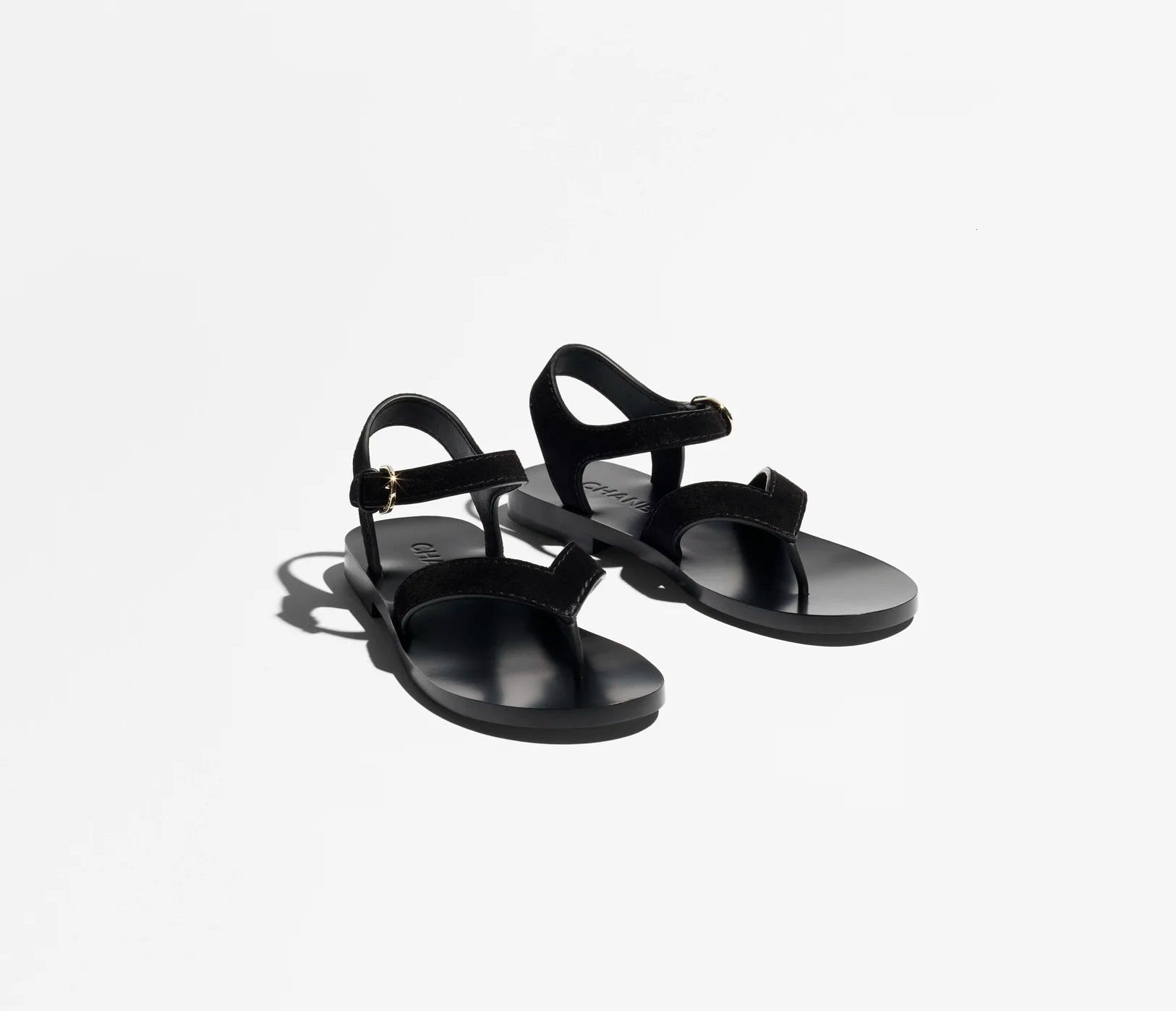 Black sandals on a white background